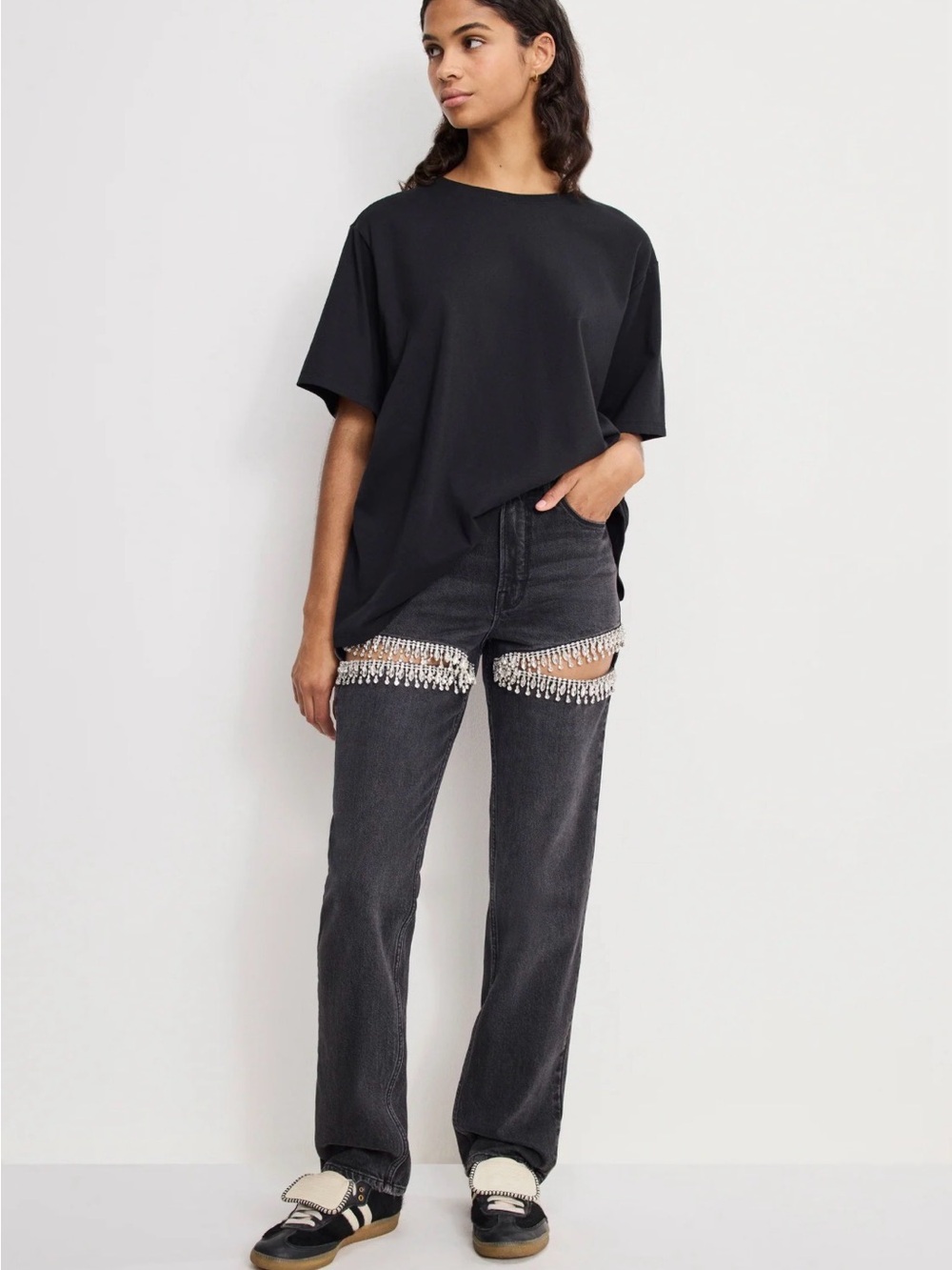 Good American Black Straight Jeans with Crystal Fringe Cutouts